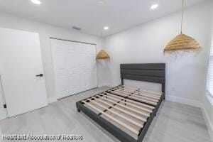 11200 S Jefferson Ave, Lake Placid, FL 33852 - unfurnished bedroom with baseboards and recessed lighting