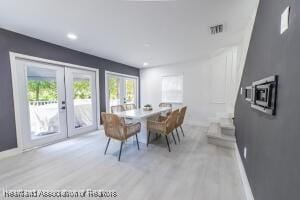 11200 S Jefferson Ave, Lake Placid, FL 33852 - dining area featuring light wood-type flooring, baseboards, recessed lighting, french doors, and visible vents