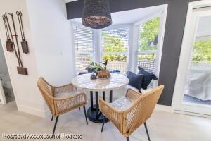 11200 S Jefferson Ave, Lake Placid, FL 33852 - dining space with baseboards