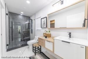 11200 S Jefferson Ave, Lake Placid, FL 33852 - bathroom featuring vanity, recessed lighting, toilet, a shower stall, and marble finish floor