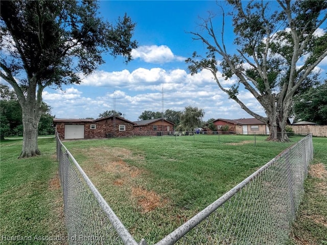 view of yard featuring a garage