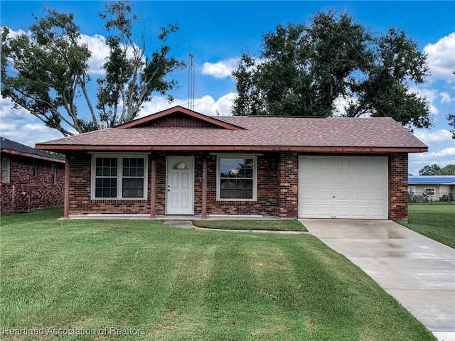 ranch-style home with a garage and a front lawn