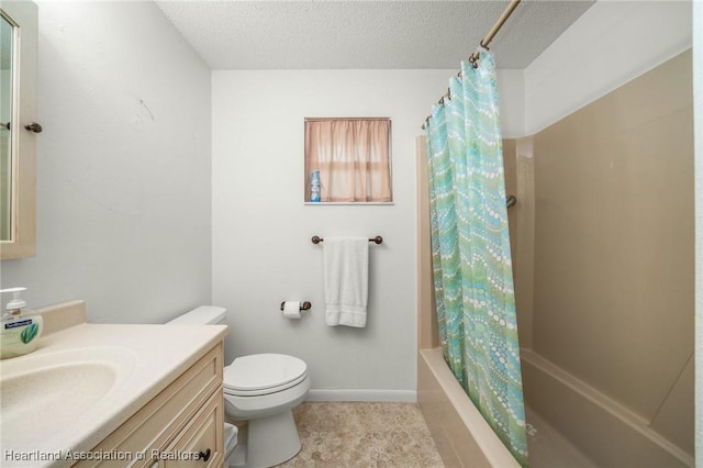 full bathroom featuring vanity, shower / bath combination with curtain, a textured ceiling, and toilet