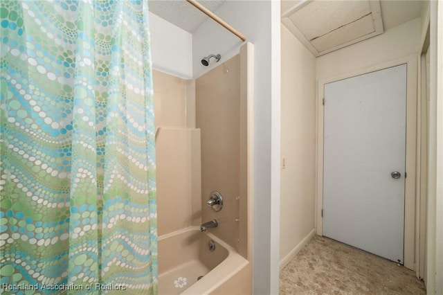 bathroom with shower / bathtub combination with curtain