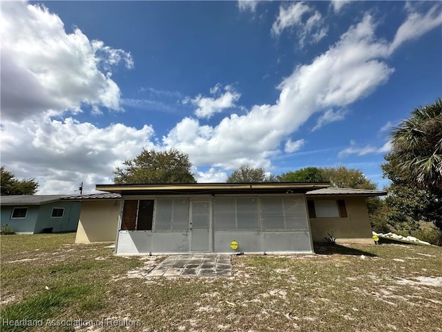 exterior space with stucco siding