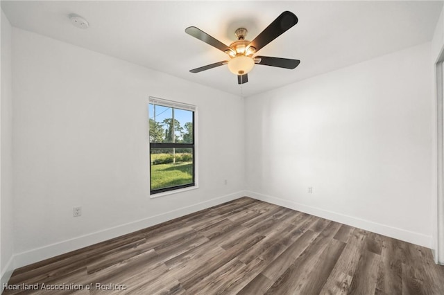 111 Blue Moon Ave, Lake Placid, FL 33852 - unfurnished room with wood finished floors, a smoke detector, baseboards, and ceiling fan