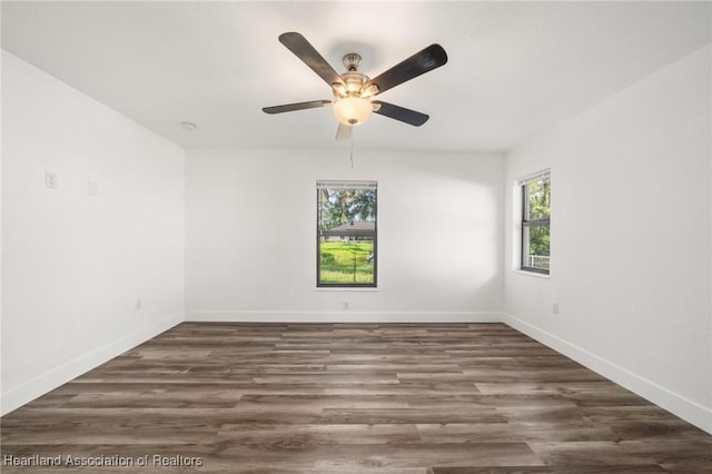 111 Blue Moon Ave, Lake Placid, FL 33852 - empty room with baseboards, wood finished floors, and a ceiling fan