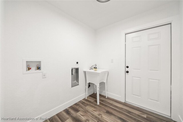 111 Blue Moon Ave, Lake Placid, FL 33852 - washroom with hookup for a washing machine, baseboards, dark wood-style flooring, and electric dryer hookup