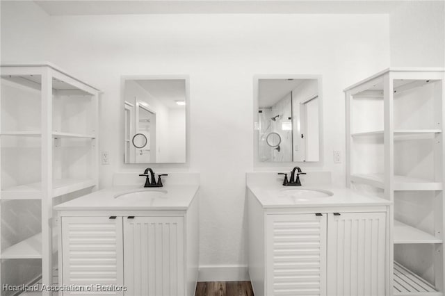 111 Blue Moon Ave, Lake Placid, FL 33852 - bathroom with two vanities and baseboards