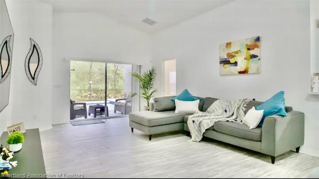 living room with a high ceiling