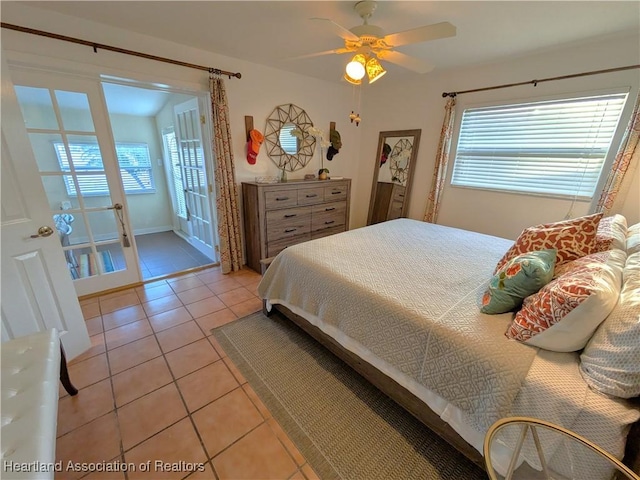 bedroom featuring ceiling fan and light tile patterned floors