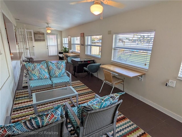 living room with vaulted ceiling and ceiling fan