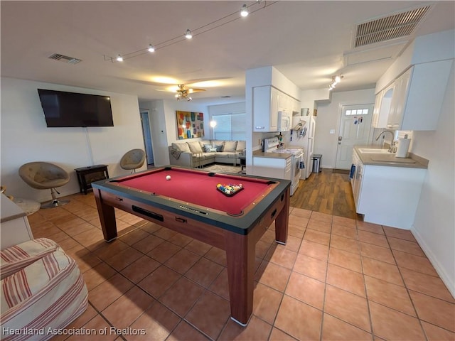 rec room with tile patterned flooring, sink, and billiards