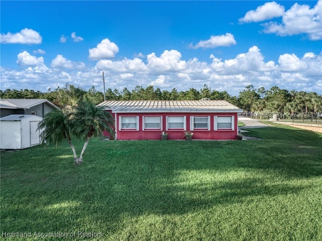 exterior space with a yard