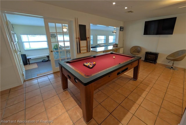 game room featuring light tile patterned flooring, pool table, and a wealth of natural light