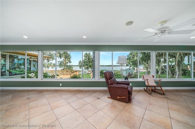 sunroom / solarium with ceiling fan