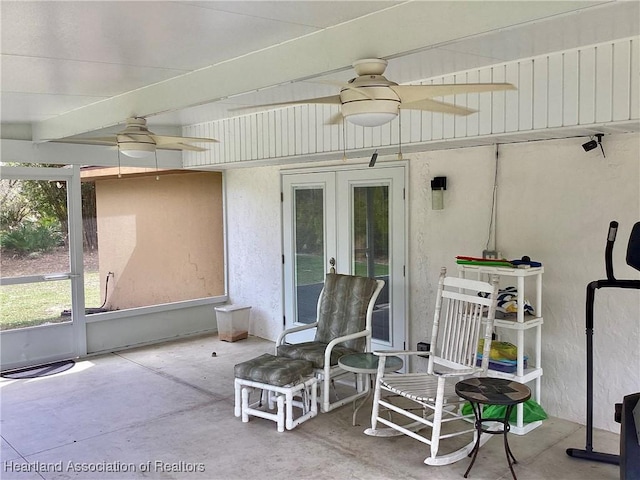 view of patio featuring ceiling fan