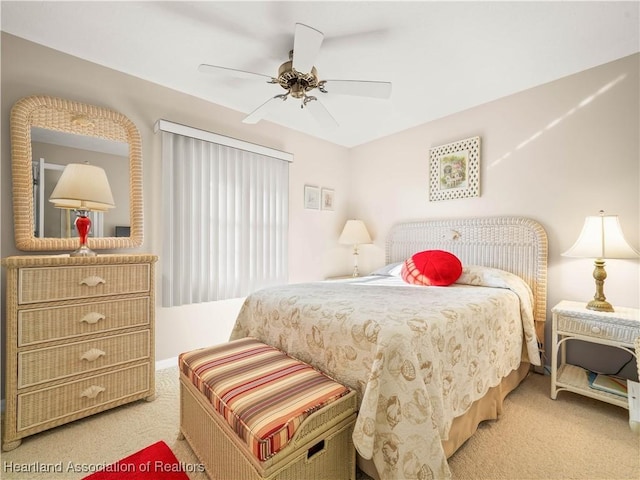 bedroom featuring ceiling fan and carpet floors