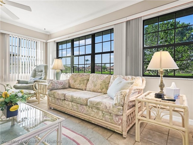 living room with crown molding and ceiling fan