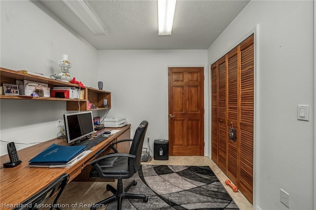 office with a textured ceiling