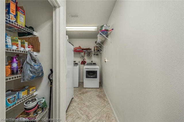 pantry with separate washer and dryer