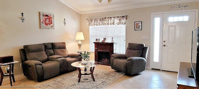 living room featuring light tile patterned floors, ornamental molding, and a healthy amount of sunlight