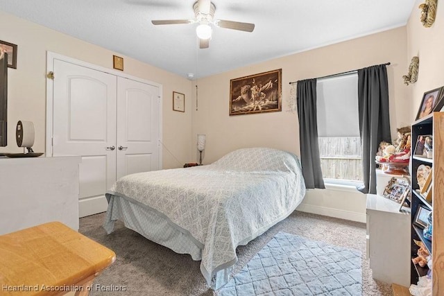 297 NE Glentry Ave NE, Port St Lucie, FL 34983 - bedroom with carpet flooring, a closet, and ceiling fan