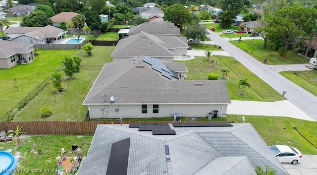 297 NE Glentry Ave NE, Port St Lucie, FL 34983 - aerial perspective of suburban area featuring a pool area