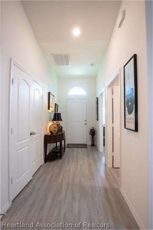 hall featuring light hardwood / wood-style floors