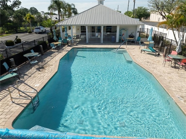 view of pool with a patio