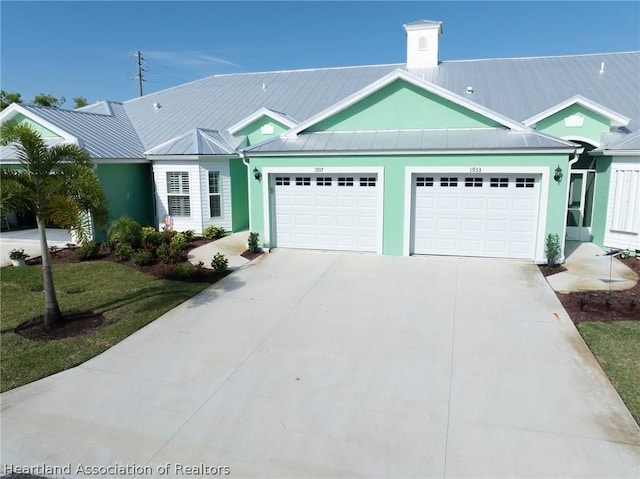 ranch-style house featuring a garage