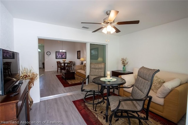 interior space featuring ceiling fan and wood-type flooring