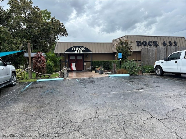 11 Mockingbird Rd, Lake Placid, FL 33852 - view of building exterior featuring uncovered parking