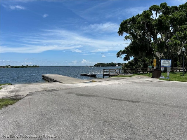 11 Mockingbird Rd, Lake Placid, FL 33852 - water view with a boat ramp and a boat dock