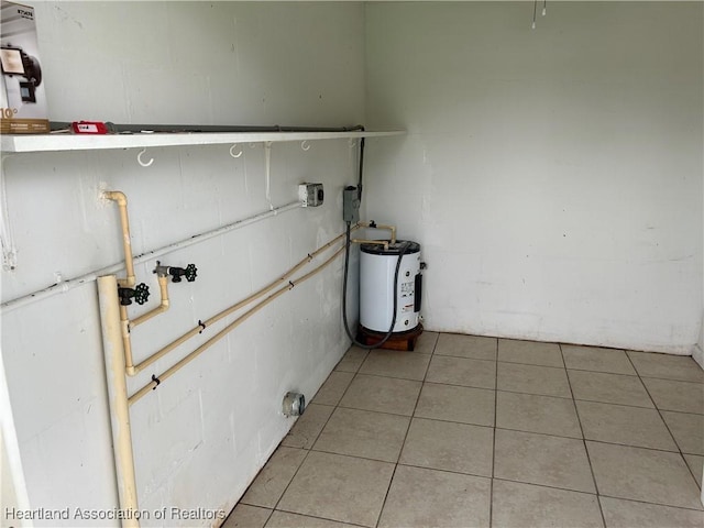 11 Mockingbird Rd, Lake Placid, FL 33852 - laundry view of electric water heater