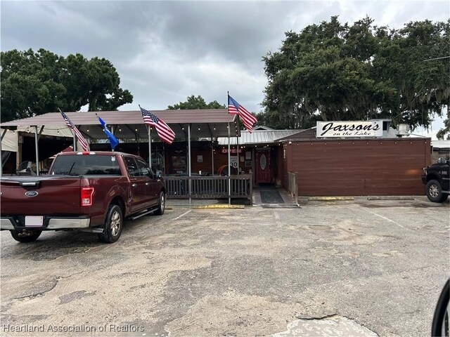11 Mockingbird Rd, Lake Placid, FL 33852 - view of uncovered parking lot