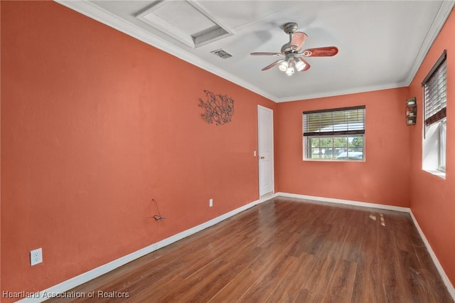 spare room featuring hardwood / wood-style flooring, ceiling fan, and ornamental molding