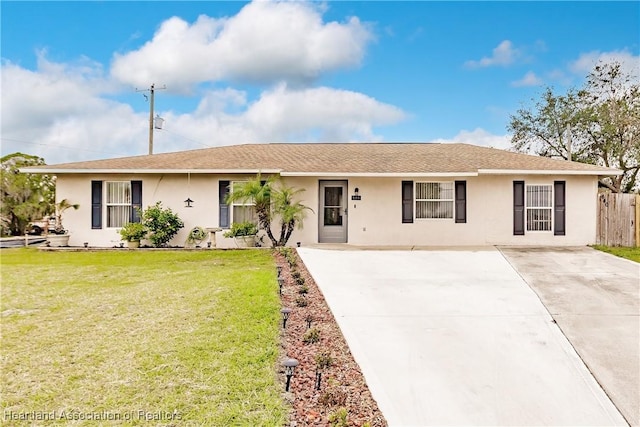 single story home featuring a front yard