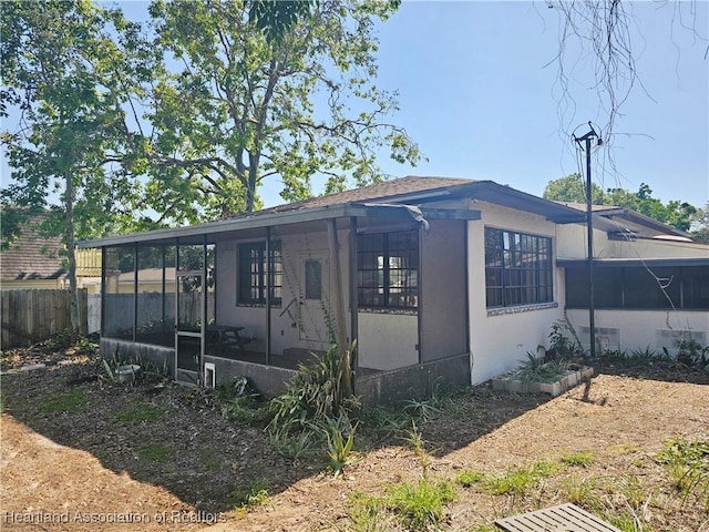 1237 Hitakee Ave, Sebring, FL 33870 - view of property exterior featuring a sunroom