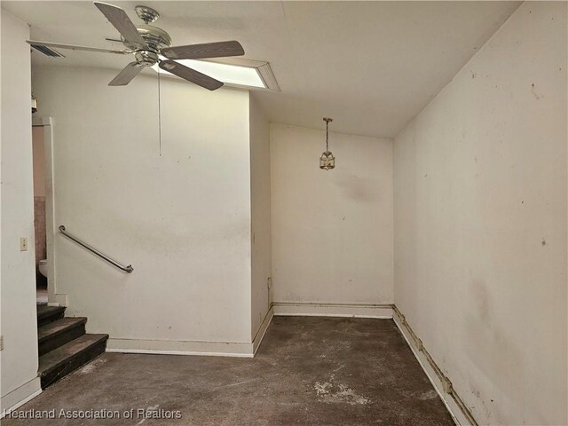 1237 Hitakee Ave, Sebring, FL 33870 - spare room with concrete flooring, ceiling fan, and baseboards