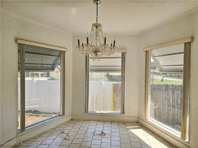 1237 Hitakee Ave, Sebring, FL 33870 - unfurnished dining area featuring ornamental molding, healthy amount of natural light, a chandelier, and baseboards