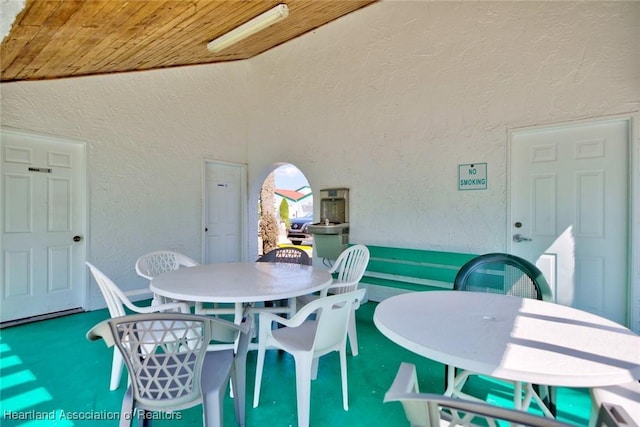 interior space with vaulted ceiling and wood ceiling