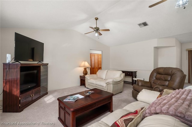 living room featuring light carpet, ceiling fan, and vaulted ceiling