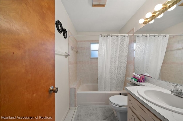 full bathroom with tile patterned floors, vanity, shower / bathtub combination with curtain, and toilet