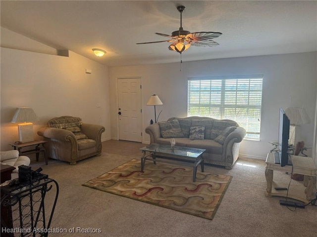 living room featuring light carpet and ceiling fan