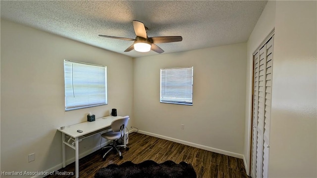 office with ceiling fan, dark hardwood / wood-style flooring, and a textured ceiling