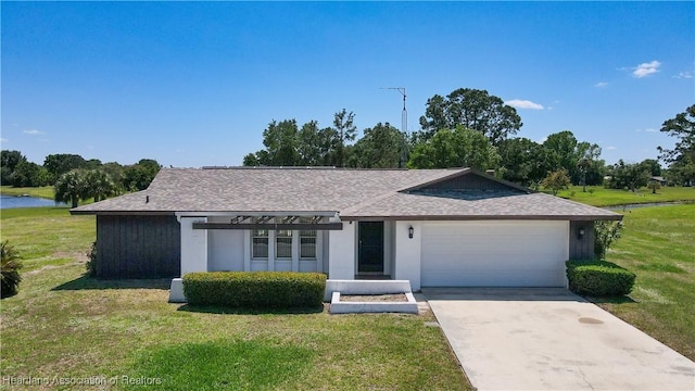 7700 Granada Rd, Sebring, FL 33876 - view of front of property featuring a garage, concrete driveway, and a front lawn