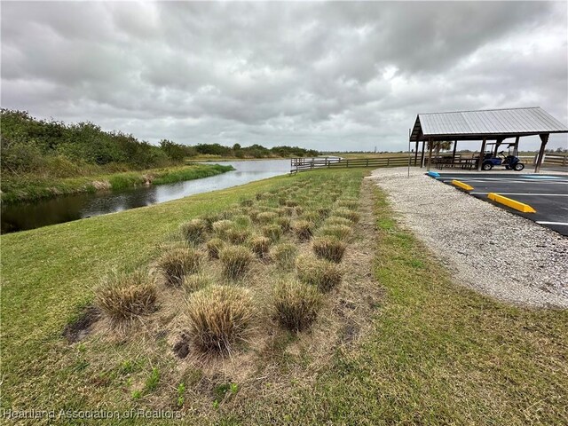 7700 Granada Rd, Sebring, FL 33876 - property view of water featuring fence
