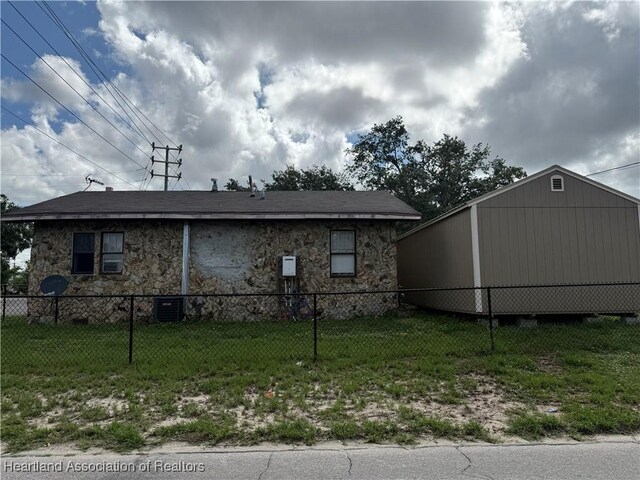 351 N Commerce Ave, Sebring, FL 33870 - view of side of property featuring stone siding