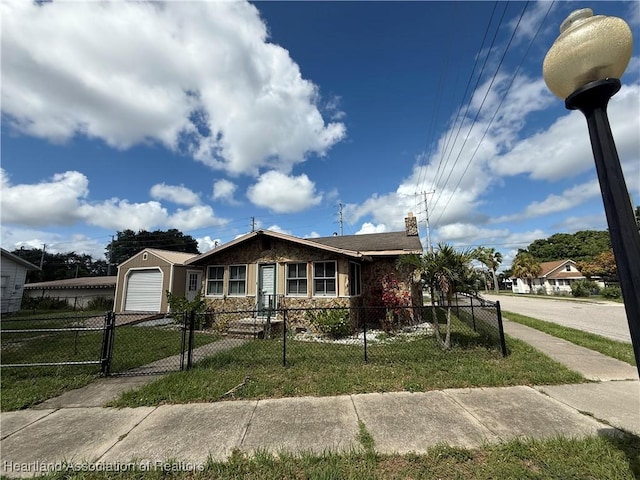 351 N Commerce Ave, Sebring, FL 33870 - view of front of home featuring a garage and a chimney